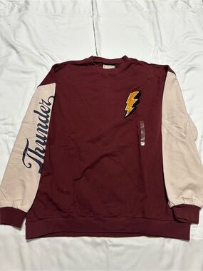 Women's Maroon Crewneck Sweater with Cream Raglan Sleeves and Lightning Patch